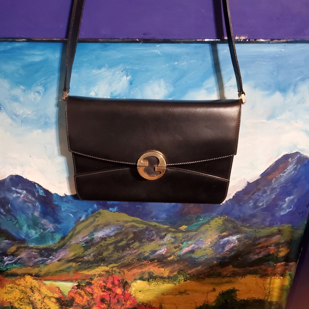 1960s Black Leather Gucci Shoulderbag/Clutch. Brass Hardware.